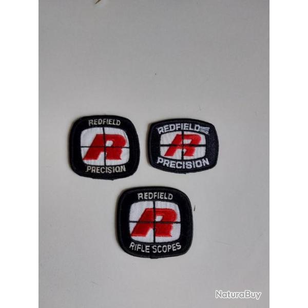 VEND TRILOGIE D'ECUSSONS REDFIELD NEUF.