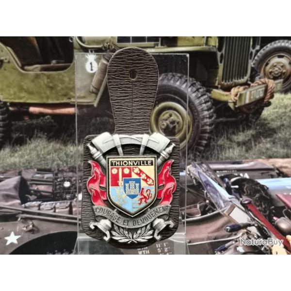 Pucelle avec son cuir d'appartenance Sapeurs Pompiers de Thionville Fabrication Delsart 4a.