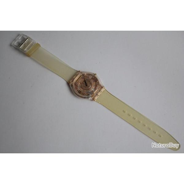 SWATCH Montre extra plate Swatch Skin Golden Jelly SFK101
