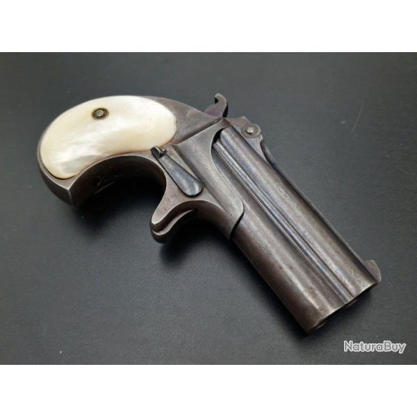 PISTOLET REMINGTON DERINGER OVER UNDER 2 COUPS CALIBRE 41 RIMFIRE PLAQUETTES NACRE - USA XIX� Tr�s b