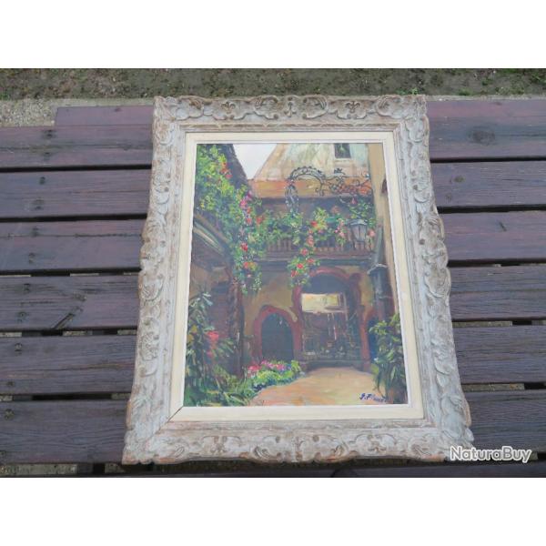Huile sur toile, repr�sentant un "Int�rieur de cour de maison Alsaciennes" - sign�e Georges PLANES