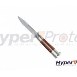 Un couteau papillon manche acier et bois