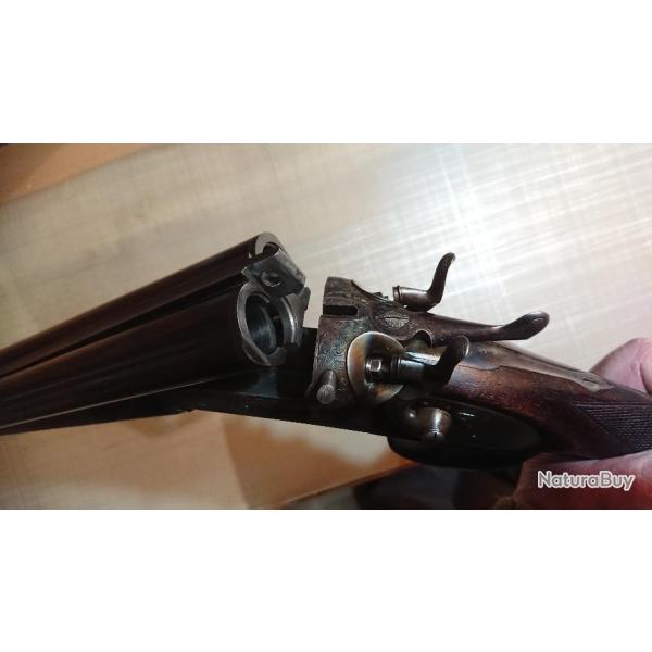 Vds un fusil cal 12 juxtapos� � chiens ext�rieurs  de 1905 �preuve poudre T en parfait �tat