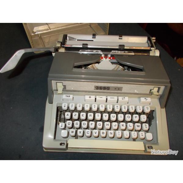 Machine � �crire OLIVETTI en tr�s tr�s bon �tat et parfaitement fonctionnelle