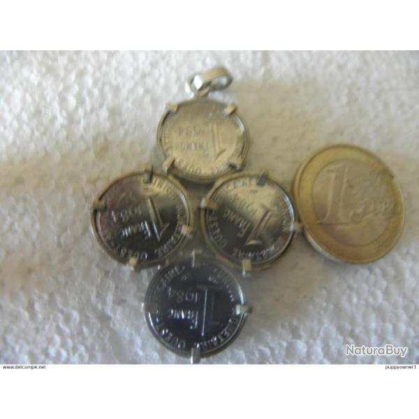 crucifix fabriqu� � partir de 4 pi�ces de 1 franc 1984 union monetaire ouest africaine