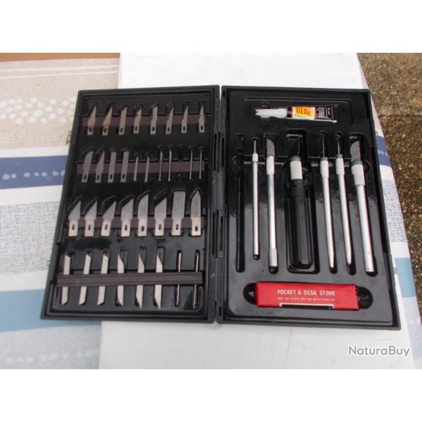 coffret de diffrents cutters,tat comme neuf