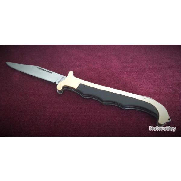 Superbe couteau pliant s�curit�- Manche composite noir et laiton-Lame acier inoxydable-Clasp-knife