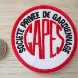 insigne &eacute;cusson GAPES, soci&eacute;t&eacute; priv&eacute;e de gardiennage, diam&egrave;tre: 70 mm