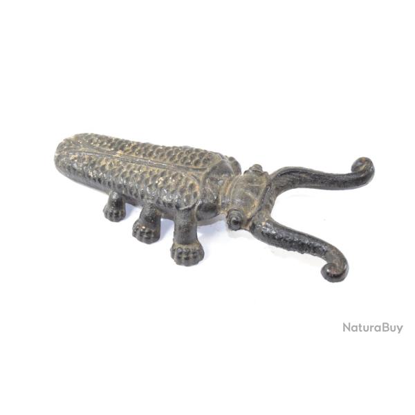 Tire botte en fonte, fin 19e - d�but 20e. Forme scarab�e Fonte Ardennaise. D�co maison de chasse