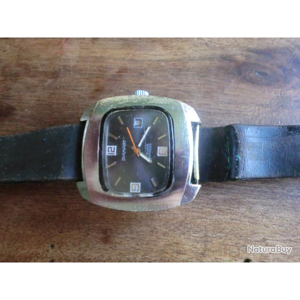 montre m�canique dateur 17 rubis / diamant