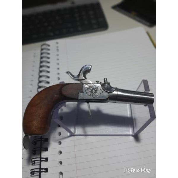 Pistolet de voyage � percussion