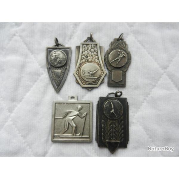 lot d'anciennes  m�dailles de sport