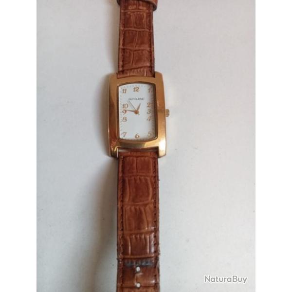 montre guy clarac num�ro 744F, fonctionne pile remis � neuf