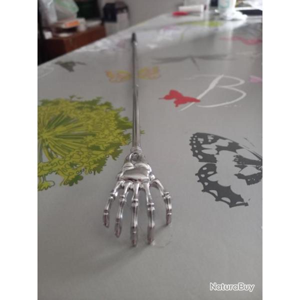 Gratte dos r�glable