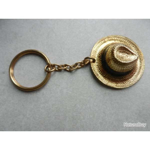 porte cls chapeau Panama en mtal couleur dor
