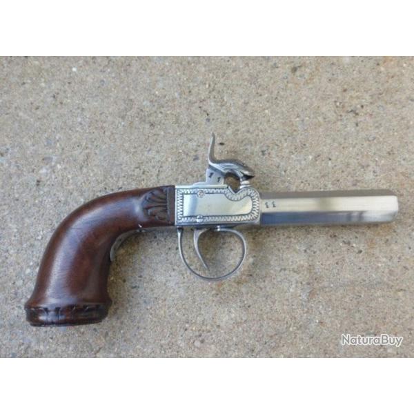 Pistolet de poche  percussion avec gravures et tte de chien - TBE