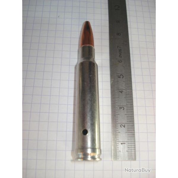 une cartouche de 338 winchester demi blind�e �tui nickel�, neutralis�e, perc�e, percut�e