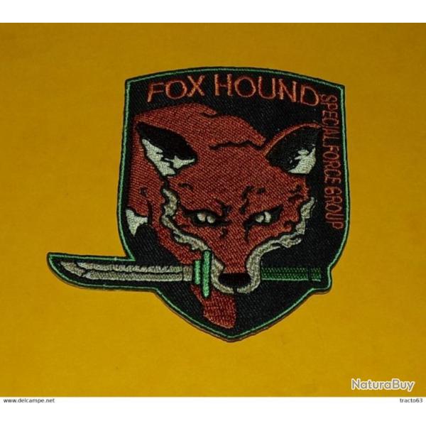 TISSU PATCH :� FOX HOUND , SPECIAL FORCE GROUP�� , HAUTEUR�9 CM , BON ETAT VOIR PHOTO . POUR TOUT RE