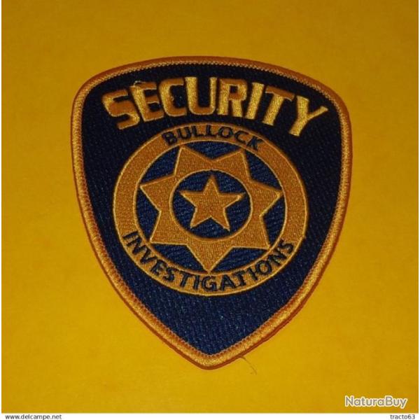 TISSU PATCH :�SECURITY BULLOCK INVESTIGATIONS  , DIAMETRE 10�CM , BON ETAT VOIR PHOTOS . POUR TOUT R