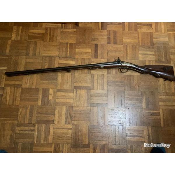 fusil � silex juxtapos� � chargement par la bouche . Les chiens fonctions mal .