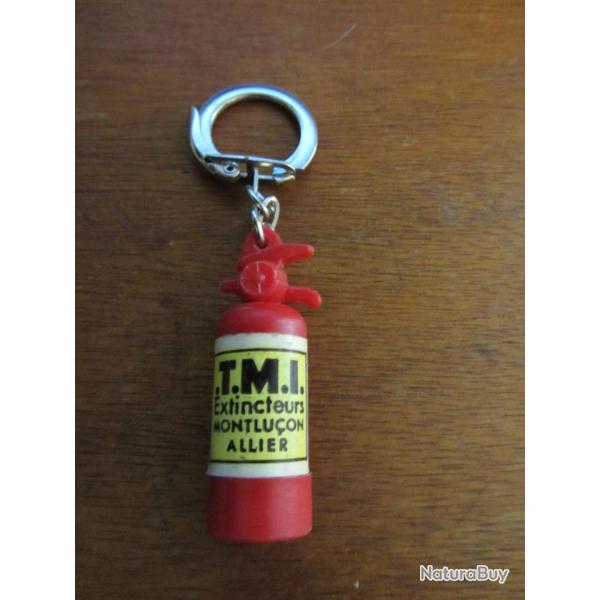 Porte cl�s extincteur T.M.I 1960