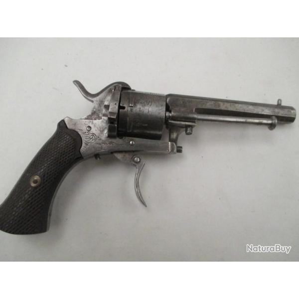 revolver  7 mm a broche   E L G  avec sa pochette  cuir  tres bon fonctionnement