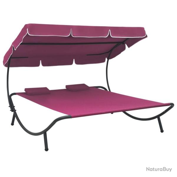Lit de repos d'ext�rieur avec auvent et oreillers rose