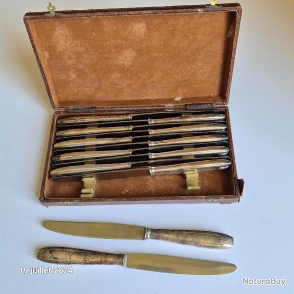 Coffret de 12 couteaux en mtal argent, vintage