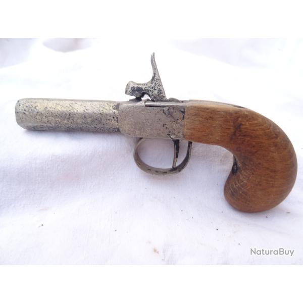 p21)  pistolet a un canon , coup de poing ,