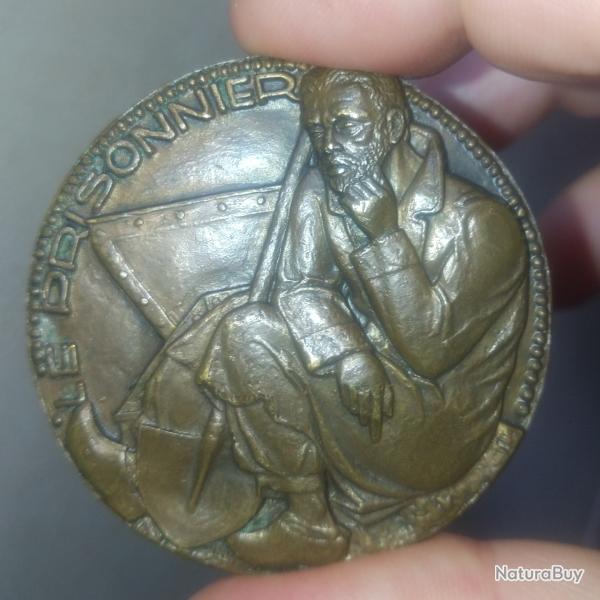 M�daille bronze - Le prisonnier.