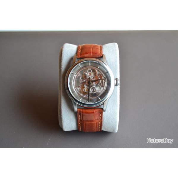 Montre Oris Artelier Translucent Skeleton sur bracelet alligator cognac