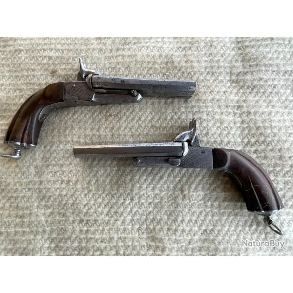 PAIRE DE PISTOLETS A BROCHE DOUBLE CANON