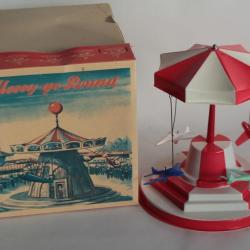 Jouet Merry-go-round celluloïd Carrousel Avions Nova Allemagne