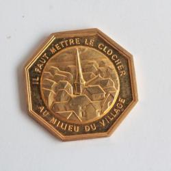 Jeton de voeux Il faut mettre le clocher au milieu du village
