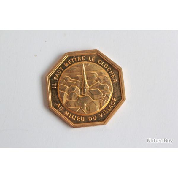 Jeton de voeux Il faut mettre le clocher au milieu du village