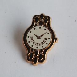 BUCHERER Pin's publicitaire Montre