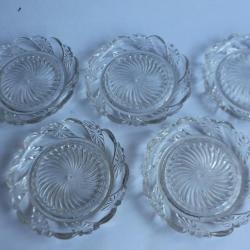 Cinq dessous de bouteille verre moulé d'époque 1900