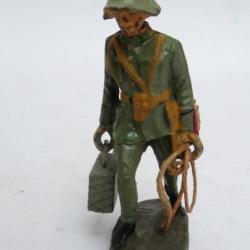 Soldat ELASTOLIN Militaire Porteur de valises et cordes Jouet Militaria