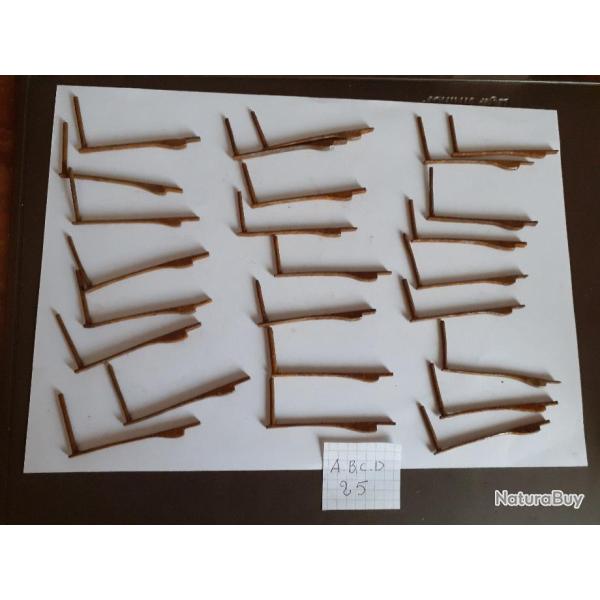 25 ressorts de grenadi�res rouill�s  ABCD