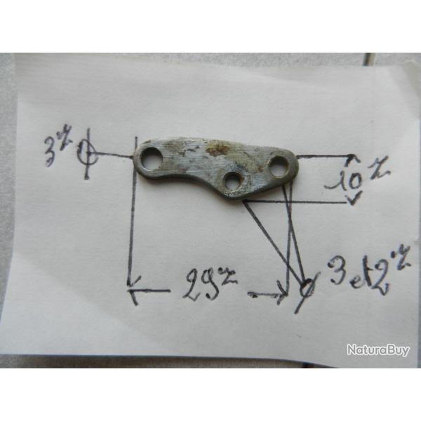 pi�ce d�tach�e bride de noix ancienne d'une arme.