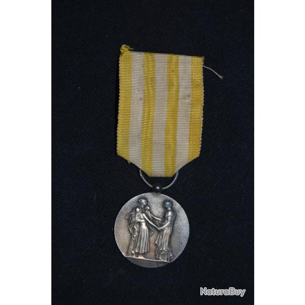 MEDAILLE ASSISTANCE PUBLIQUE (ARGENT)-MINISTERE DE L'INTERIEUR-ATTRIBUEE Mme BASTIEN  1911