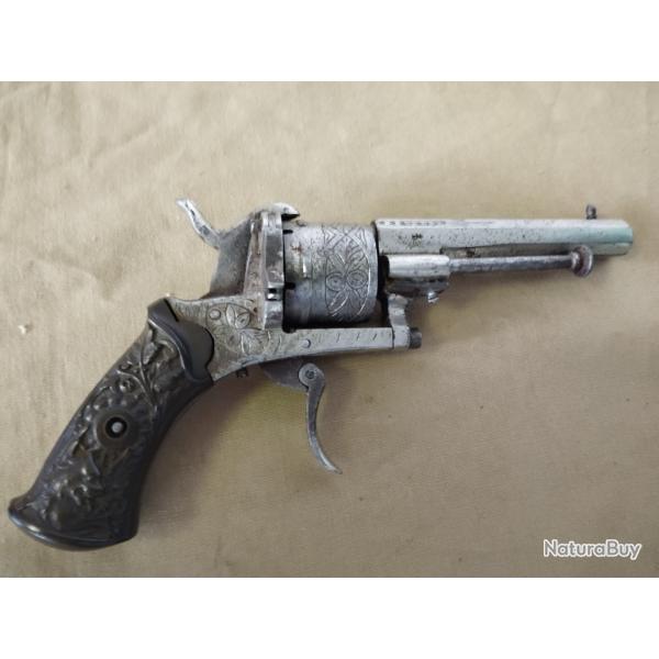 Revolver a broche grav�