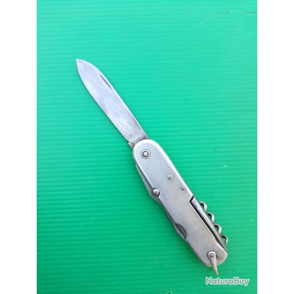 ANCIEN COUTEAU PLIANT  .  SEPT  FONCTIONS  .  PLAQUETTES  ALUMINIUM  .