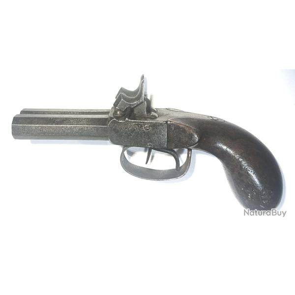 Pistolet � broche et � deux canons octogonaux.