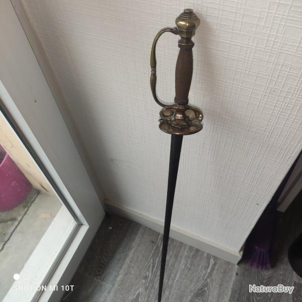 Magnifique pe 18e donc je ne connais pas le modle sculpture sur la lame