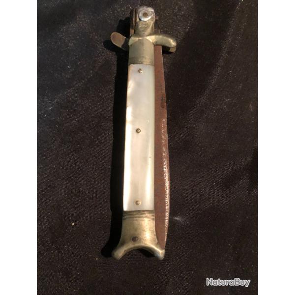 couteau pliant manche en nacre a restaurer avec accident et manque