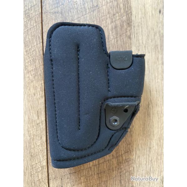 Holster port discret