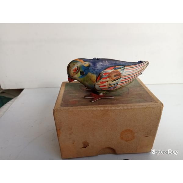 jouet oiseaux en mtal blanc 1968 fonctionne avec clef longueur 7,5 cm hauteur 4 cm