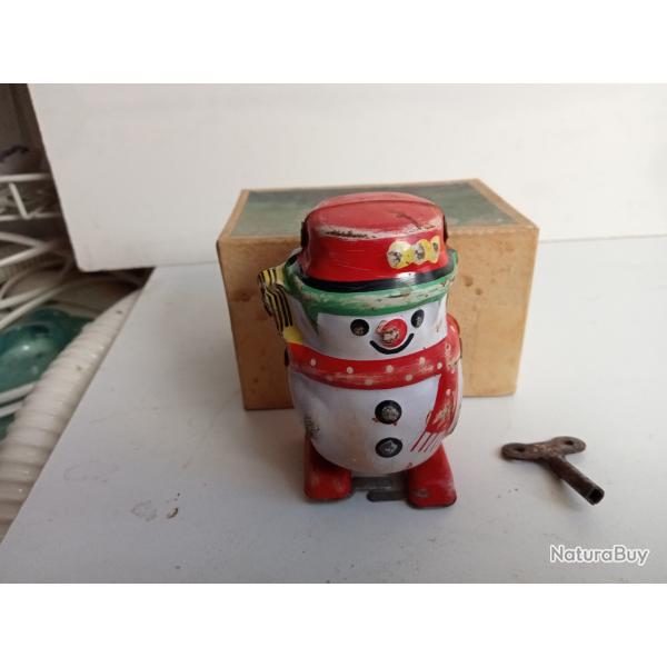 jouet bonhomme de neige en mtal blanc 1961 fonctionne avec clef hauteur 8 cm