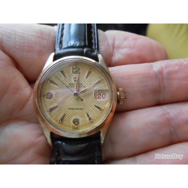 rolex pr�cision dame ,cadran nid d'abeille champagne A VOIR EXCEPTIONNELLE